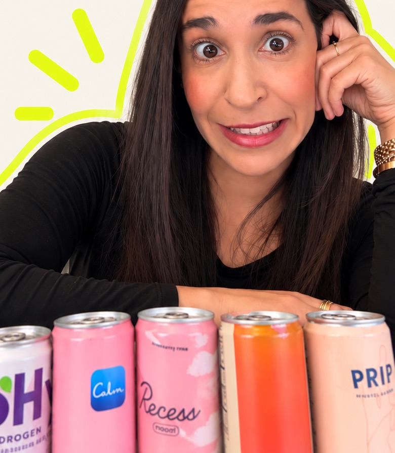Luisa behind a row of functional and mood beverage cans
